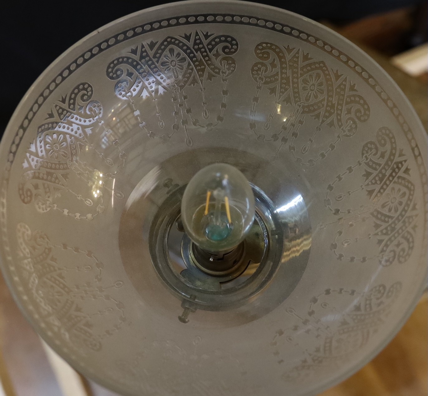 A mid 19th century brass twin branch gasolier with etched crystal glass shades, drop 100cm. width 90cm